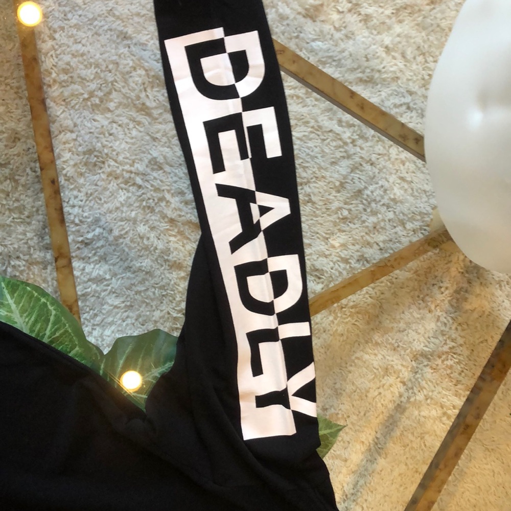 NWT H&M black sweatshirt with “DEADLY” on sleeves